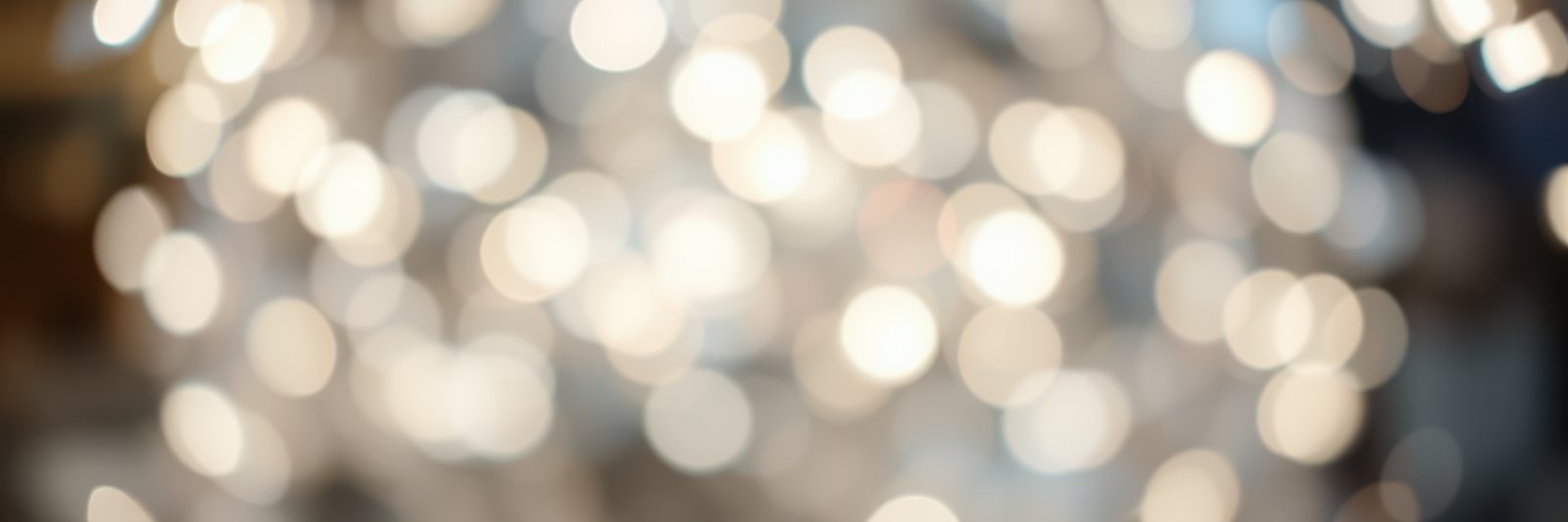 Bright sparkling lights create a festive atmosphere in a cozy indoor setting during the holiday season